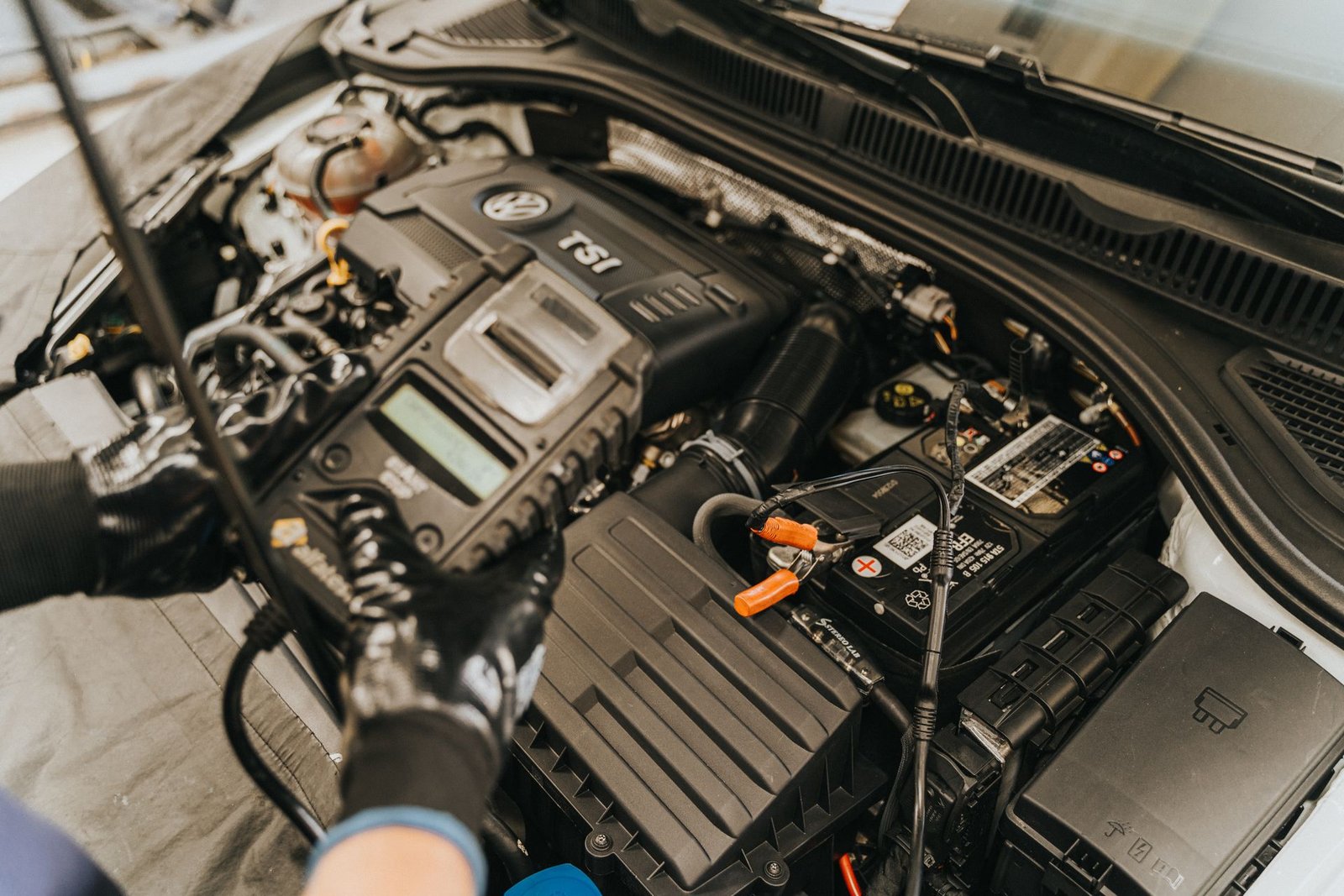 Testing a car battery with a multimeter